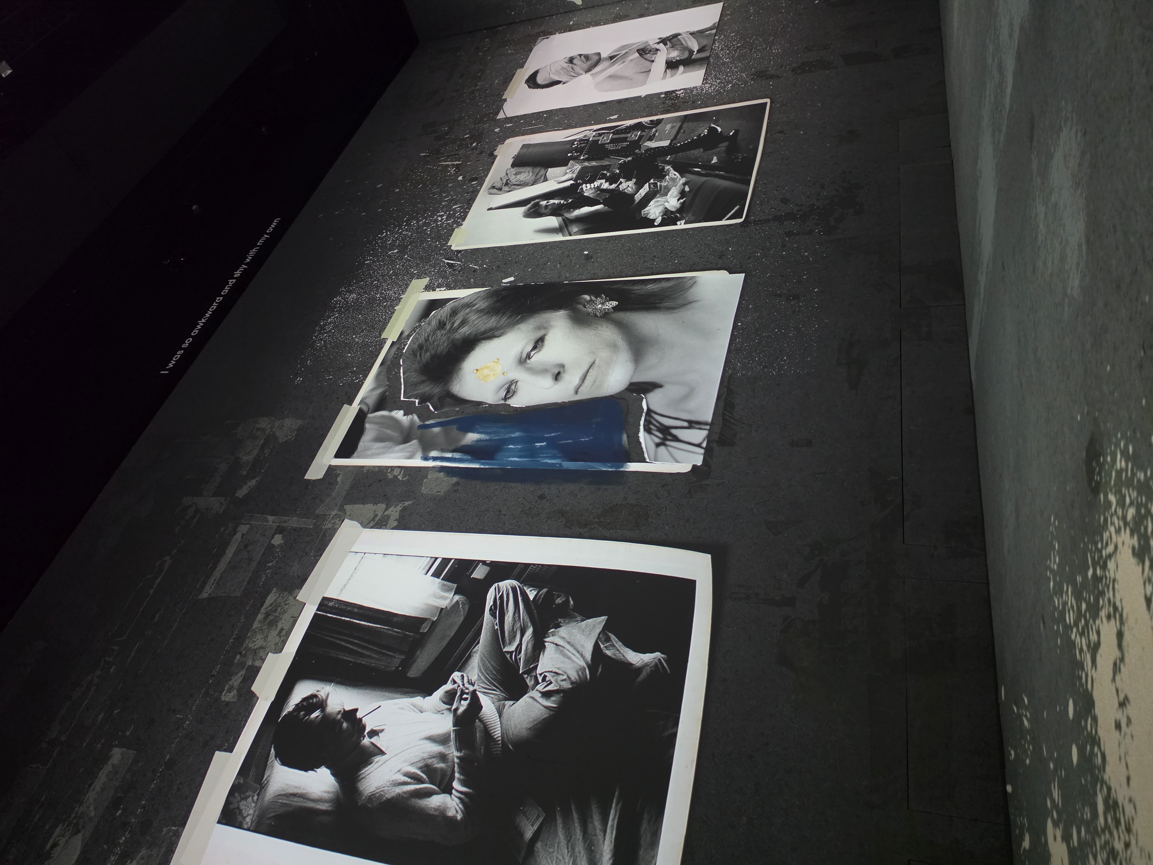 Four taped polaroids